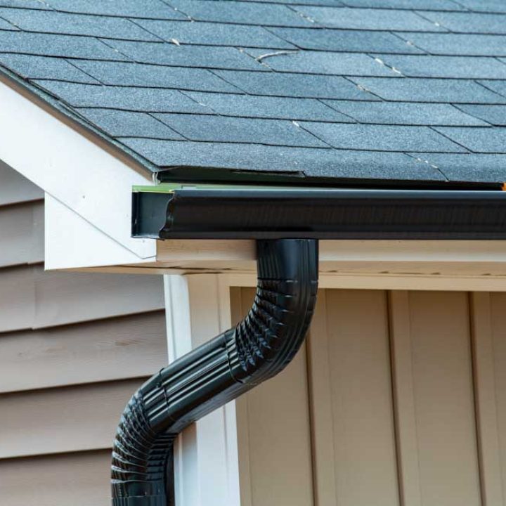Rain gutter of roof with downpipe new metal pipecorner